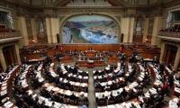 Der Nationalratssaal im Bundeshaus: Dort können die Kantone Wallis und Zürich bei den Parlamentswahlen 2015 mit je einem zusätzlichen Sitz rechnen.
